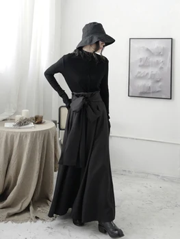 Små mørke designer uregelmæssige dekonstruktion halv længde nederdel, høj talje, slim nederdel, en online mode