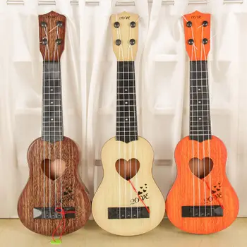 Musical Instrument Mini Ukulele Børn Guitar Legetøj Kreative Skole, Spille Spil Tilfældig Farve